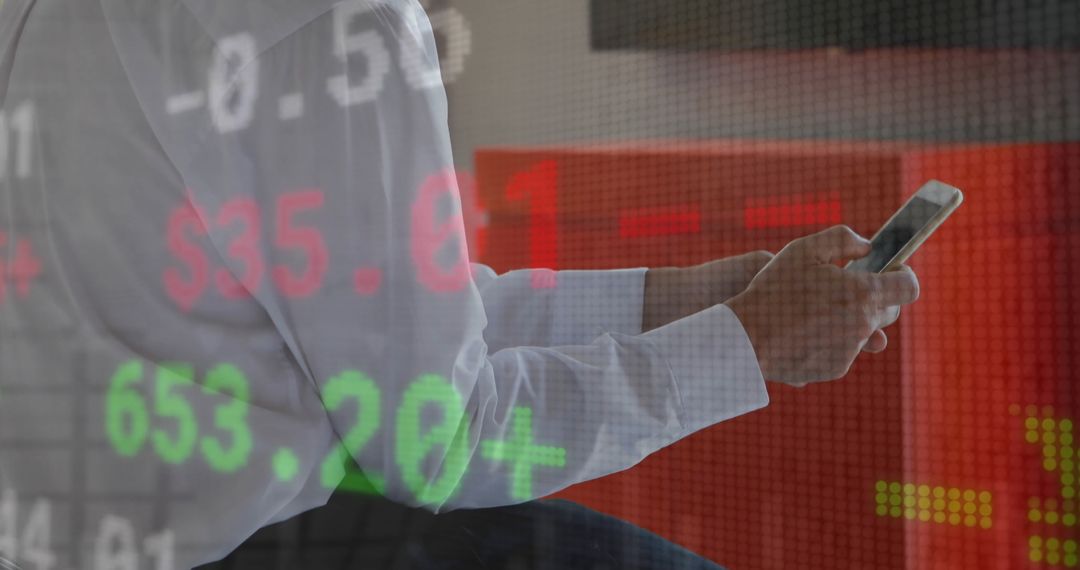 Businessman Analyzing Financial Market Data on Smartphone