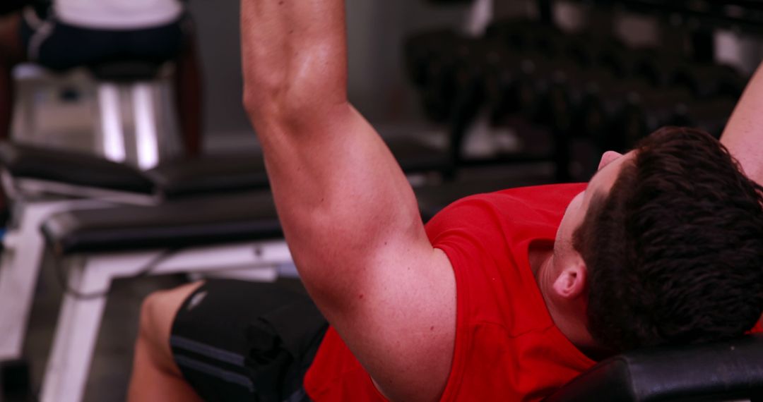 Young Man Working Out on Bench Press in Gym - Free Images, Stock Photos and Pictures on Pikwizard.com