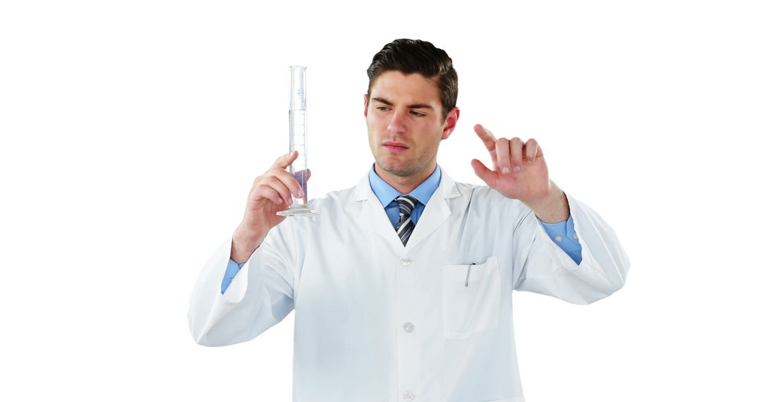 Scientist carefully examining liquid in graduated cylinder - Free Images, Stock Photos and Pictures on Pikwizard.com