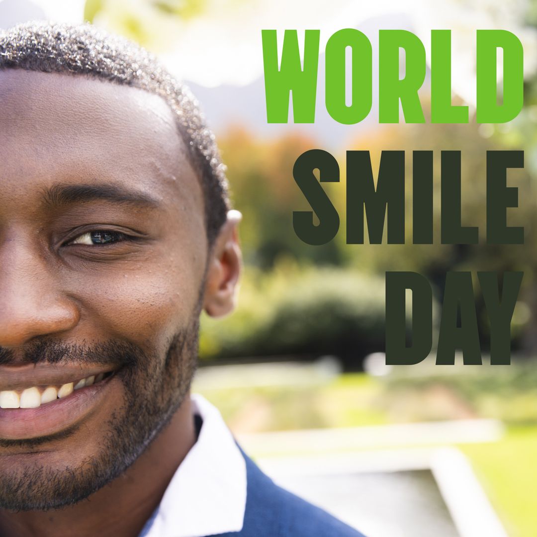 Smiling Man Celebrating World Smile Day in Park