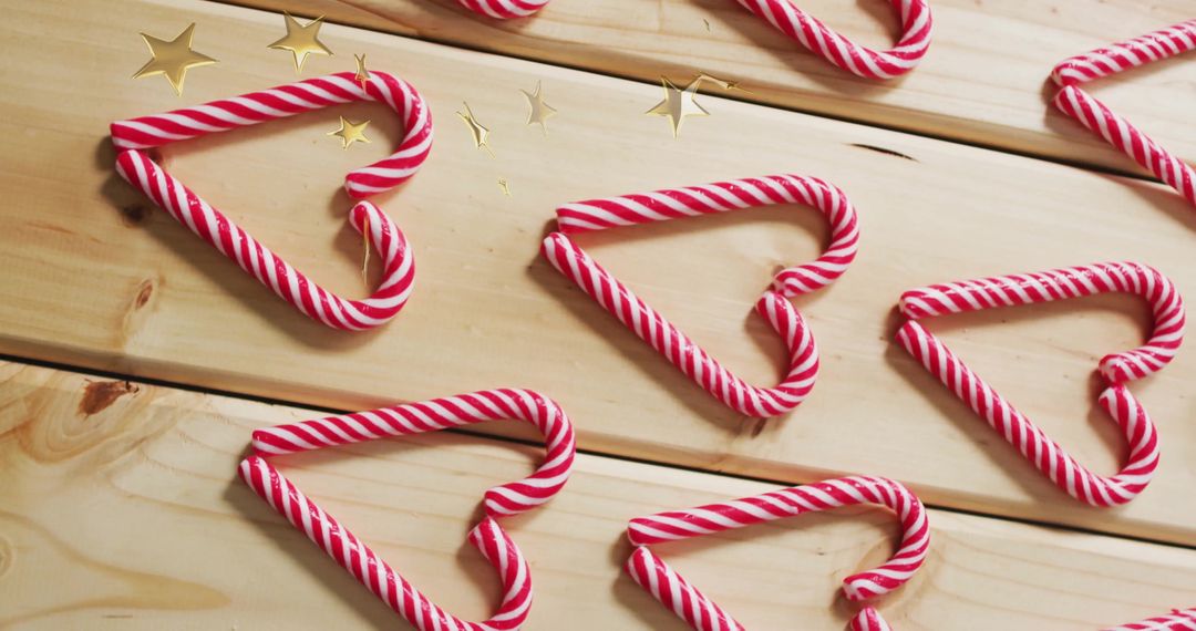 Heart-Shaped Candy Canes Arranged on Wooden Table