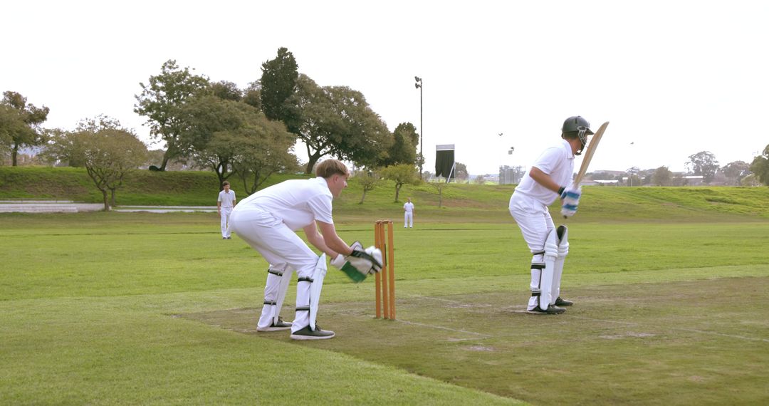 Cricketers on Field During Competitive Match