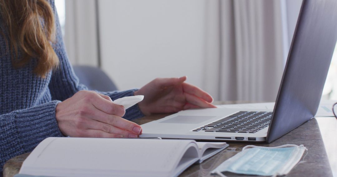 Woman Taking Temperature While Working from Home During Pandemic - Free Images, Stock Photos and Pictures on Pikwizard.com