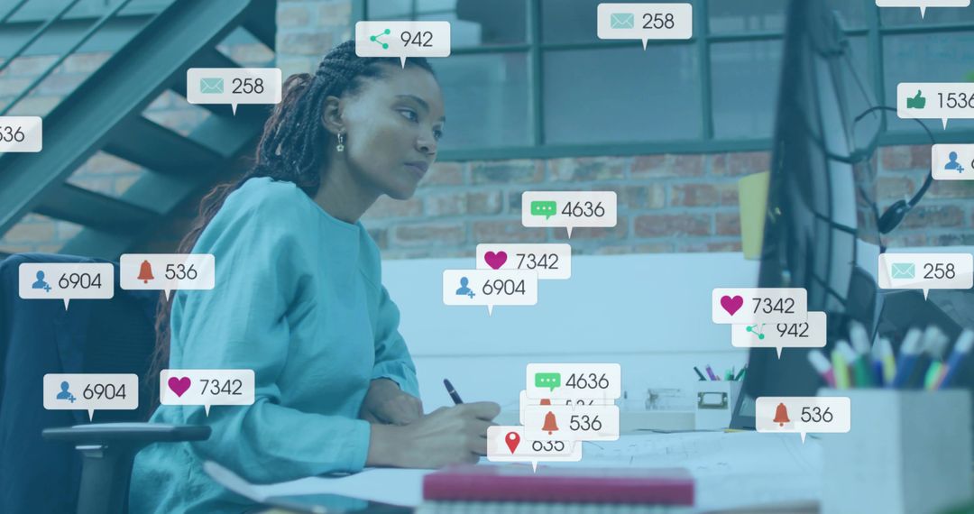 Woman working desk with floating social media notifications showing engagement overload