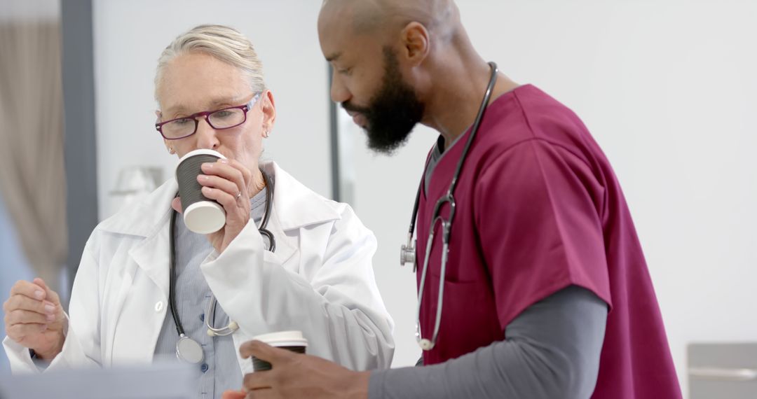 Healthcare Professionals Drinking Coffee During Break - Free Images, Stock Photos and Pictures on Pikwizard.com