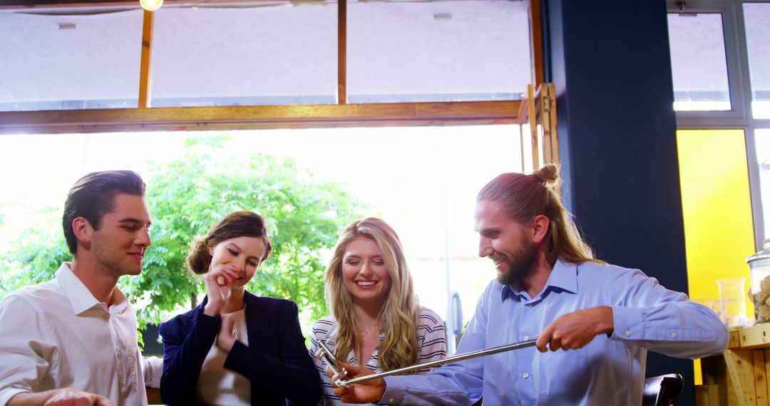 Friends Enjoying Cafe Time and Checking Smartphone Together