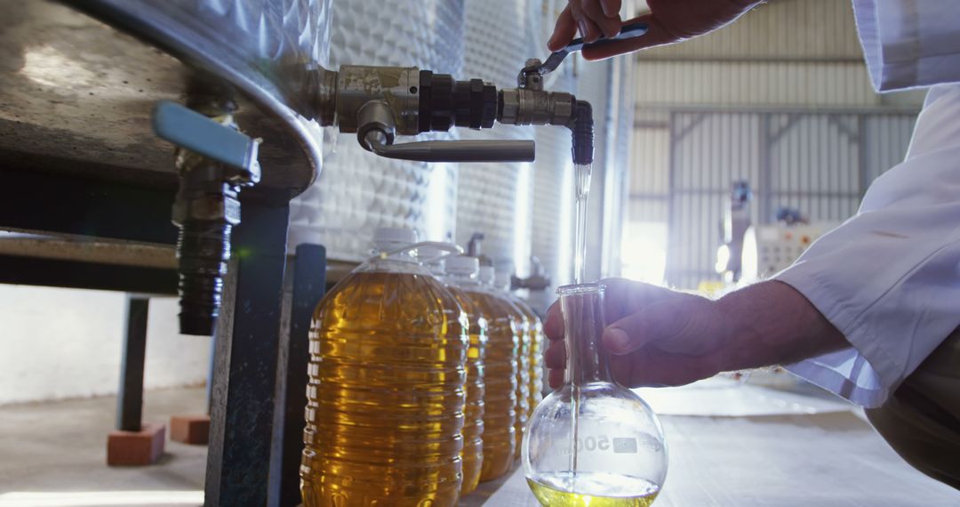 Scientist Collecting Liquid Sample in Laboratory - Free Images, Stock Photos and Pictures on Pikwizard.com