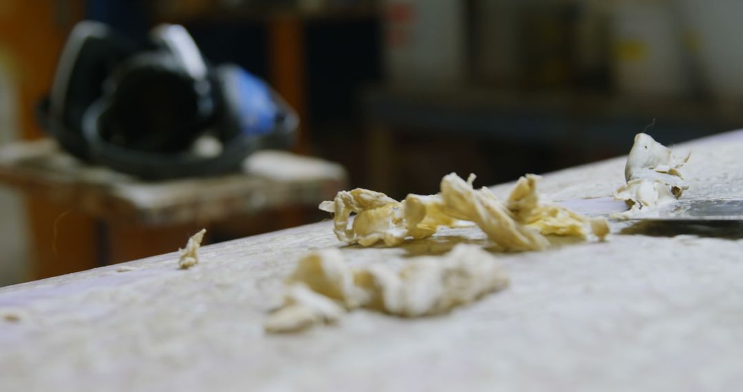 Close-Up View of Wood Shavings on Workshop Table - Free Images, Stock Photos and Pictures on Pikwizard.com