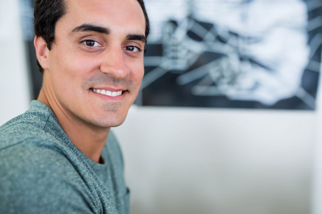 Confident Professional Smiling in Modern Office Space