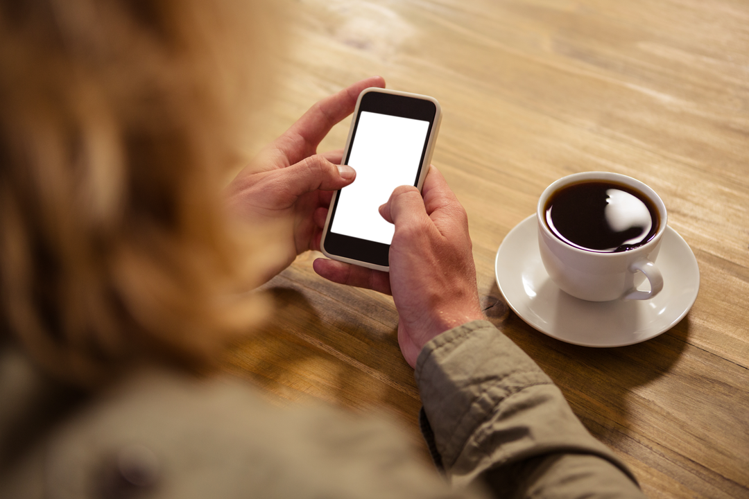 Transparent Smartphone Use in Cafe with Coffee Cup - Download Free Stock Images Pikwizard.com