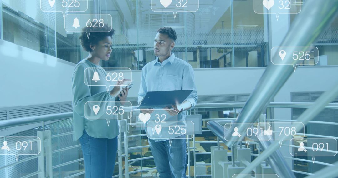 Collaborating with AR Analytics Using Laptop and Phone on Modern Office Mezzanine