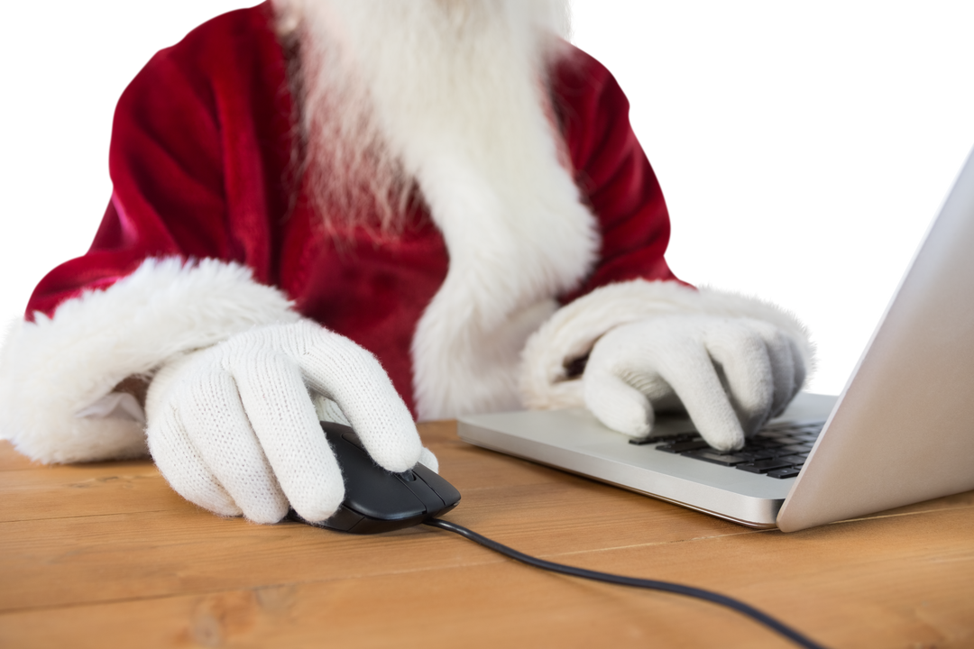 Transparent Santa Claus Typing with Laptop and Mouse at Desk - Download Free Stock Images Pikwizard.com