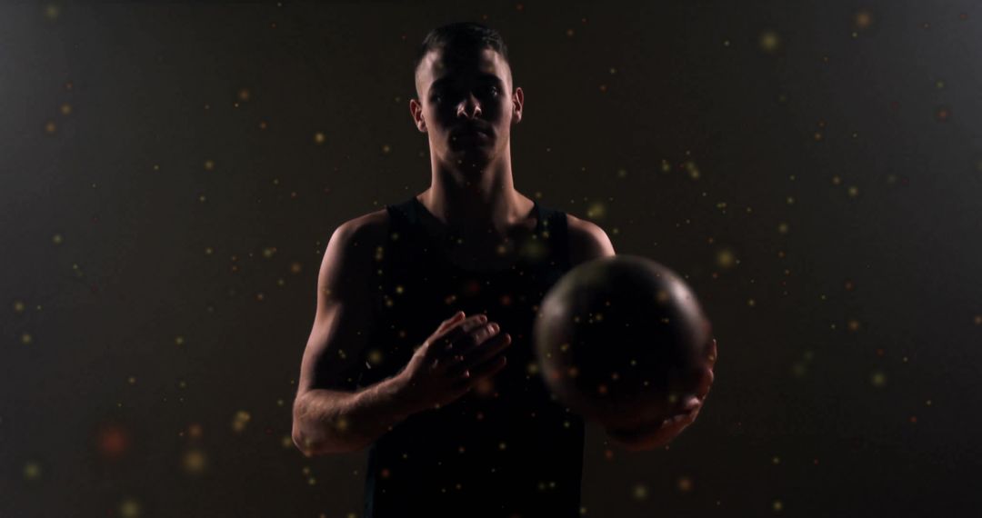 Basketball Player Holding Ball with Dynamic Particles Effect
