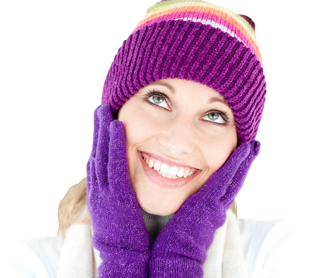 Cheerful Woman Wearing Purple Winter Accessories and Colorful Knit Hat - Download Free Stock Images Pikwizard.com