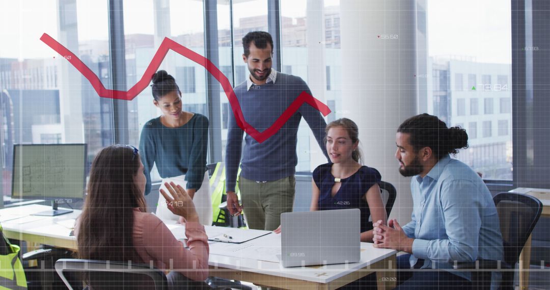 Diverse Business Team Analyzing Declining Financial Graph in Modern Office
