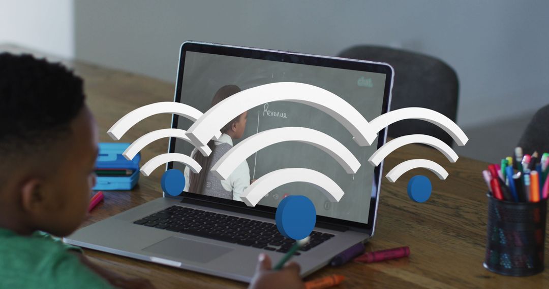 Boy Attending Virtual Class on Laptop in Home Study Setup