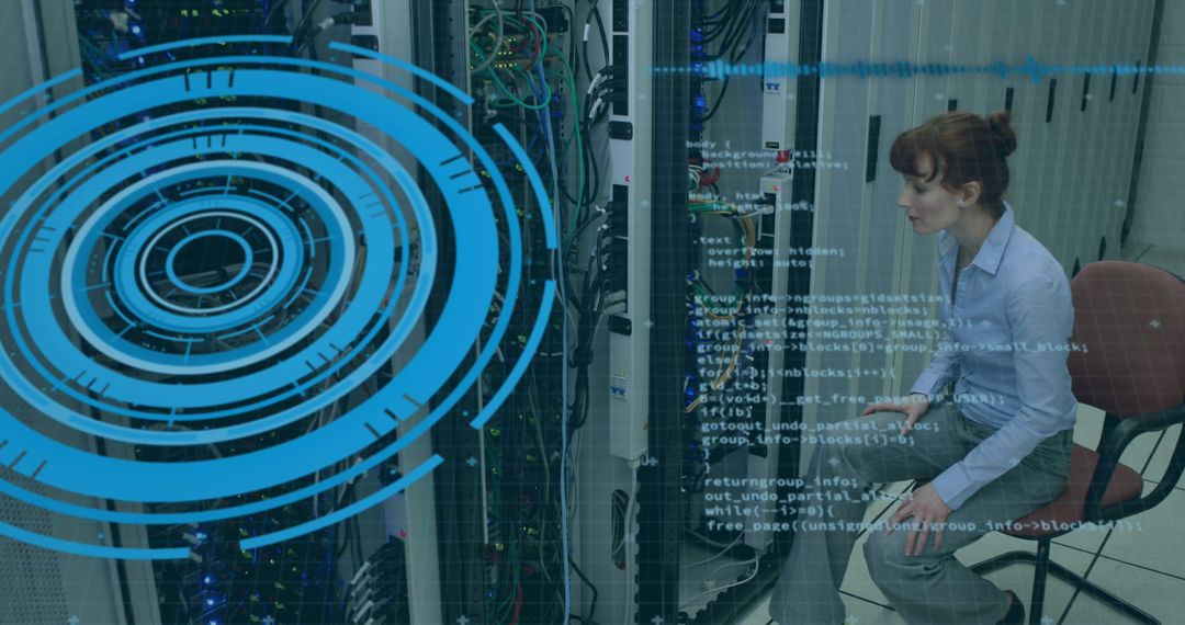 Woman Analyzing Data in Server Room