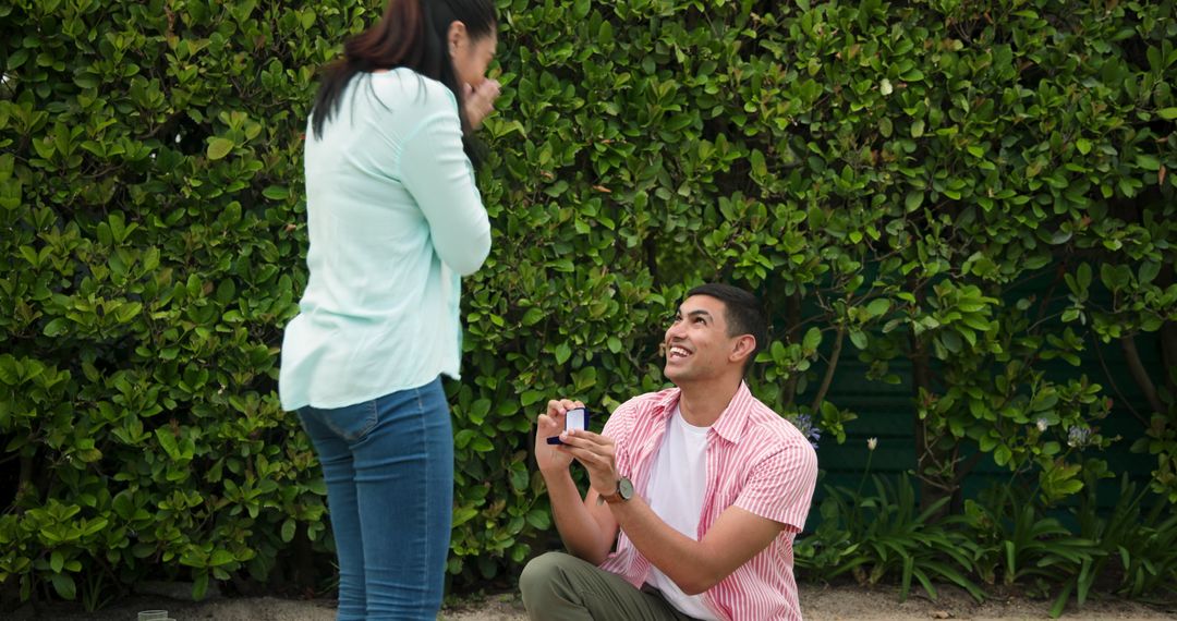 Man Proposing in Garden Surprise Engagement