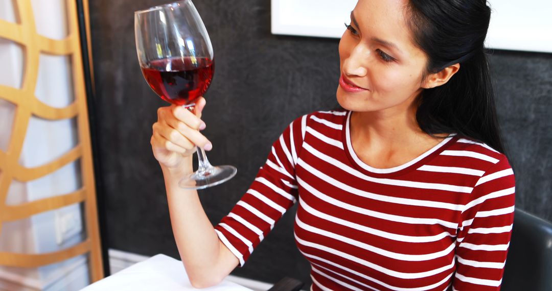 Woman Enjoying Wine in Modern Restaurant - Free Images, Stock Photos and Pictures on Pikwizard.com