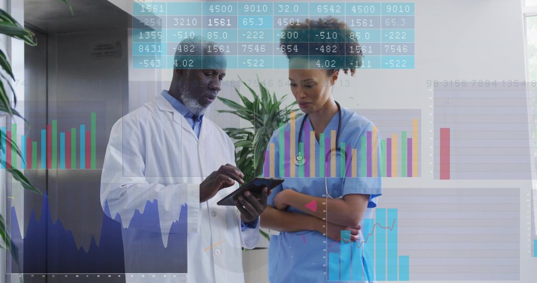 Physician and nurse reviewing tablet with data and charts overlay in hospital corridor