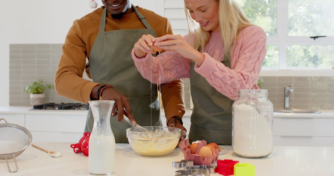 Diverse Couple Enjoys Baking Together in Bright Home Kitchen