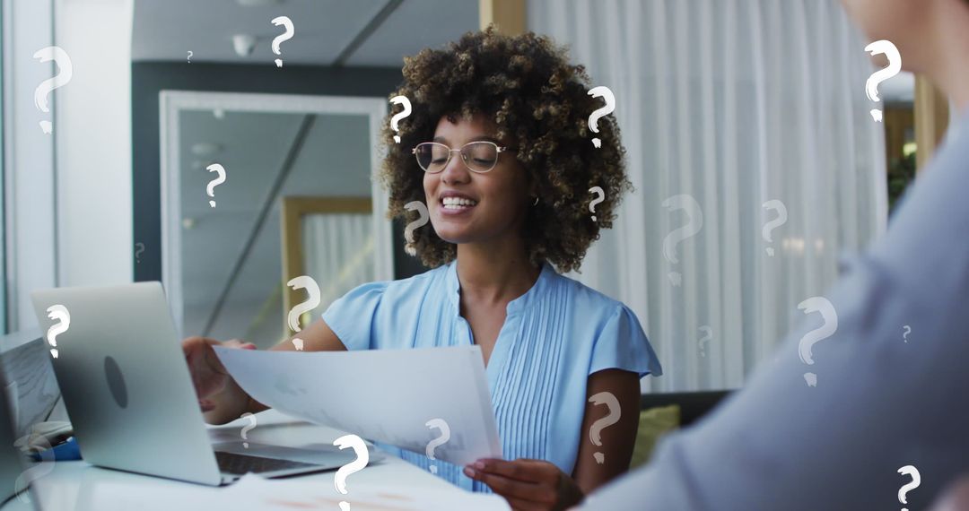 Diverse Businesswoman Reviewing Documents with Colleague