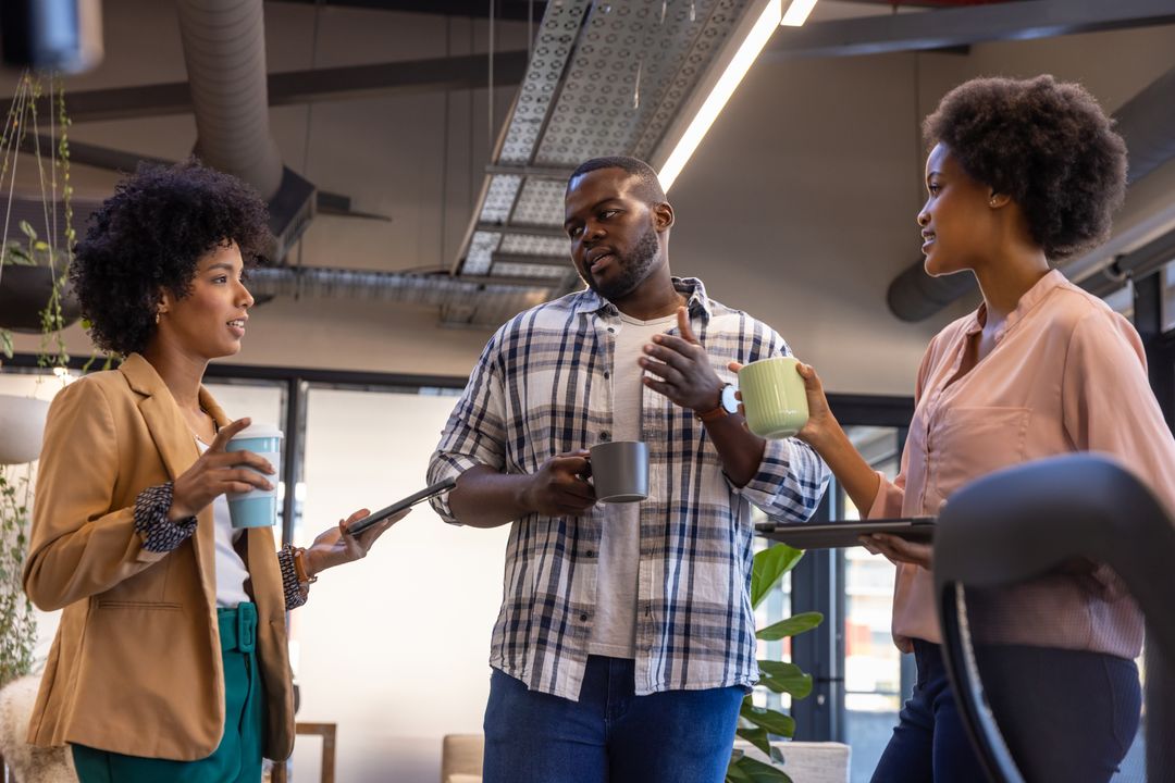 Diverse Colleagues Sharing Ideas in a Modern Office