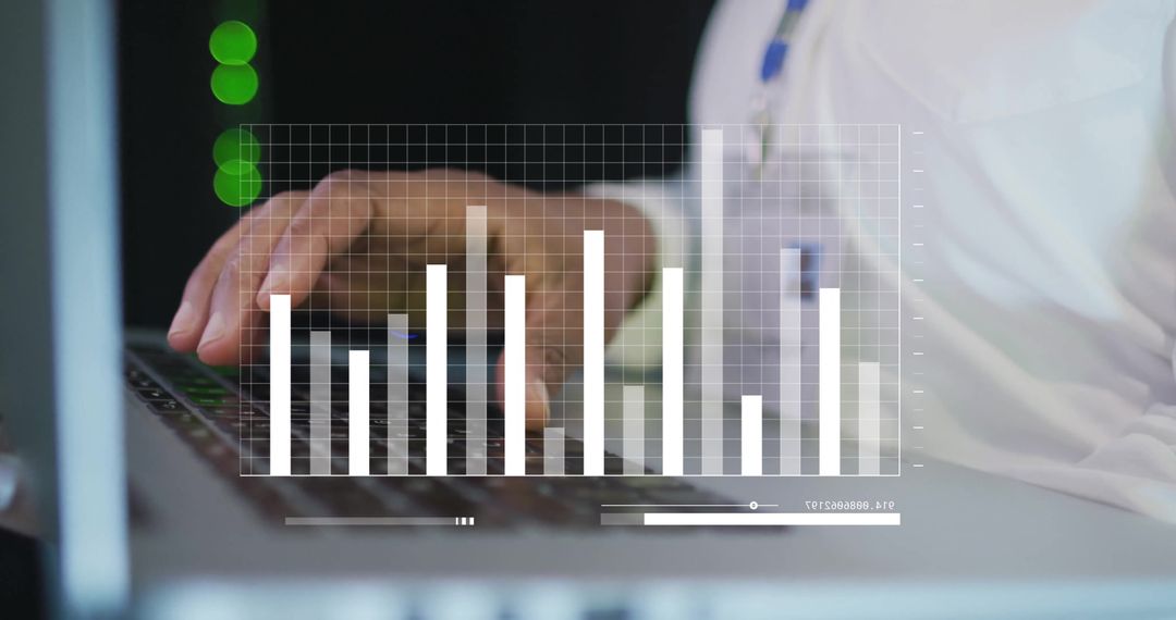 Business Analyst Utilizing Laptop with Visualized Data Graphics