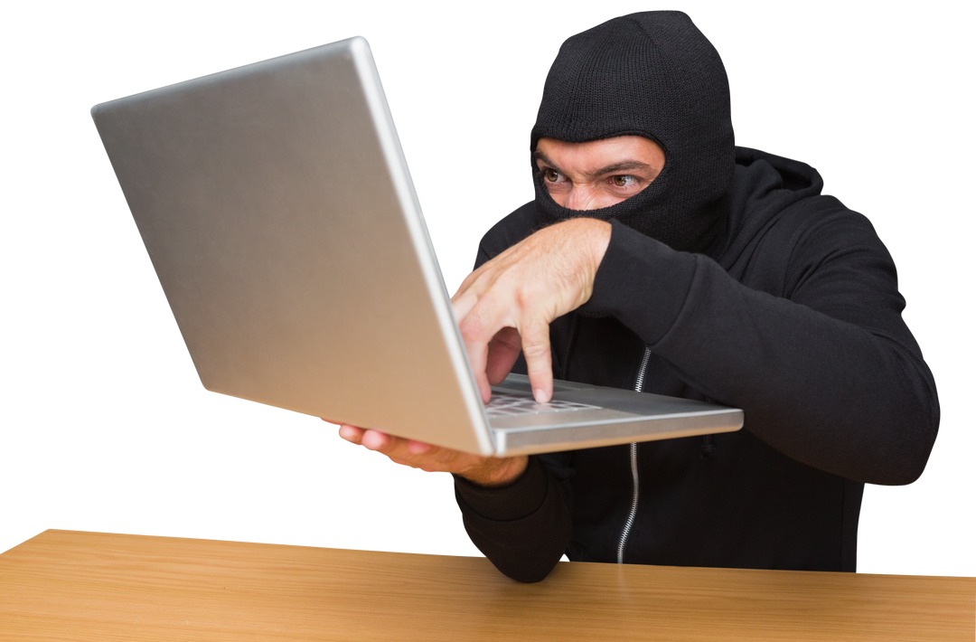 Masked Man with Laptop Stealing Identity at Desk Transparent Background - Download Free Stock Images Pikwizard.com