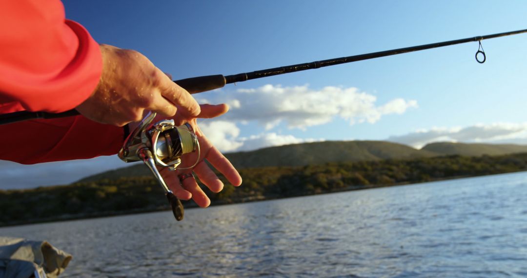Close-up of a fisherman's hands holding a fishing rod, with copy space - Free Images, Stock Photos and Pictures on Pikwizard.com