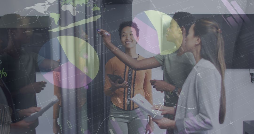 Creative Business Team Analyzing Data with Digital Graphs