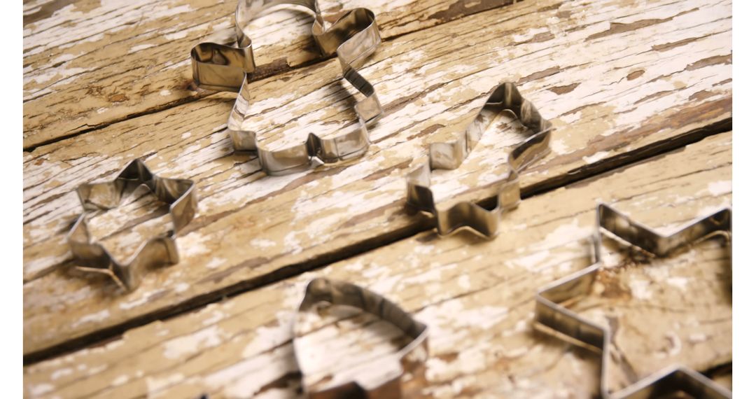 Christmas Cookie Cutters on Rustic Wooden Surface