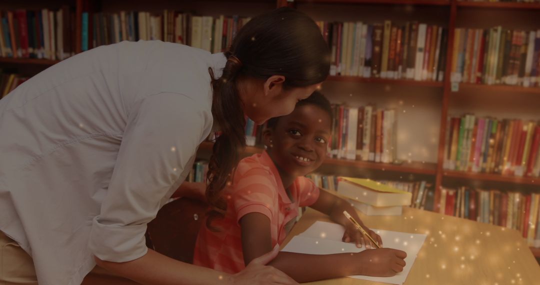 Female Teacher Assisting Schoolboy in Library with Learning