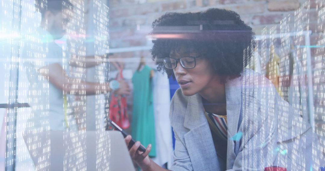 Fashion Designer Using Smartphone for Business Communication