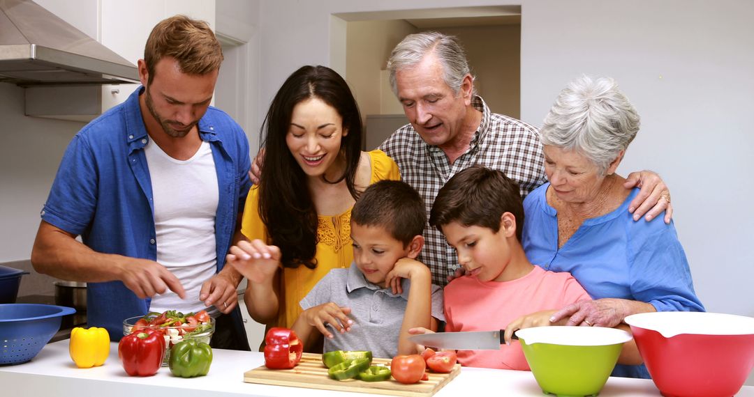 Multigenerational Family Preparing Food in Kitchen - Free Images, Stock Photos and Pictures on Pikwizard.com