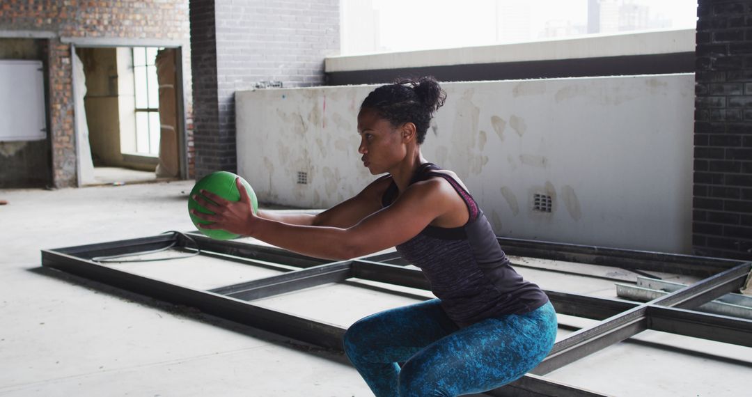 Woman Exercising Indoors with Medicine Ball - Free Images, Stock Photos and Pictures on Pikwizard.com