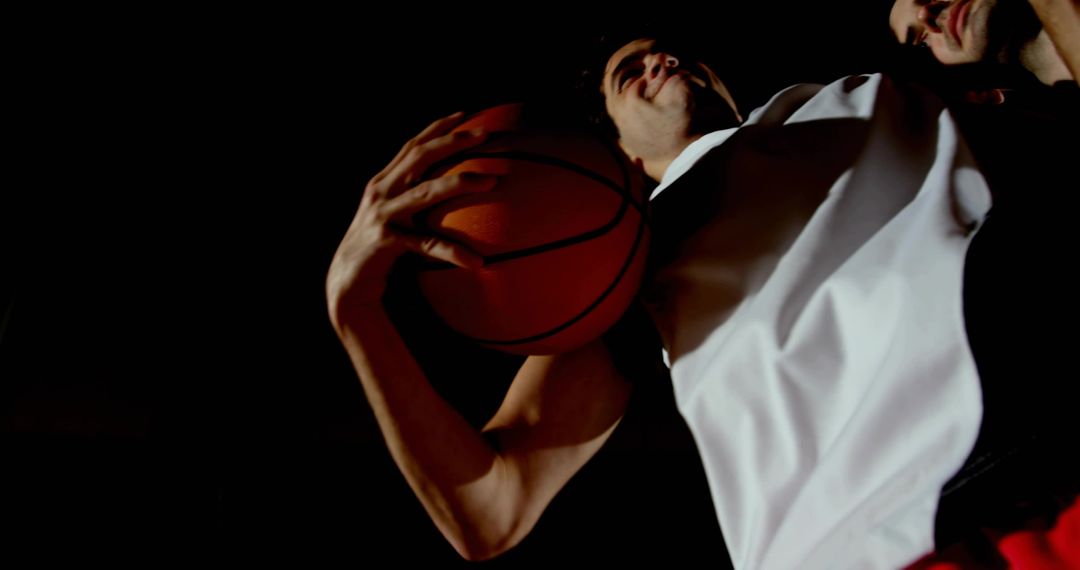 Athletic Action Player Preparing Powerful Dunk in Gymnasium