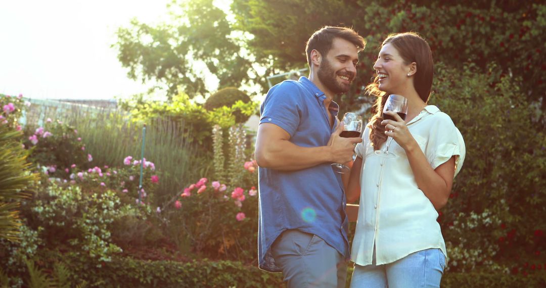 Happy Couple Enjoying Wine in Outdoor Garden - Free Images, Stock Photos and Pictures on Pikwizard.com