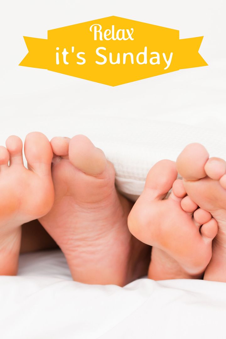 Couple Relaxing Under Blanket Invoking Sunday Leisure