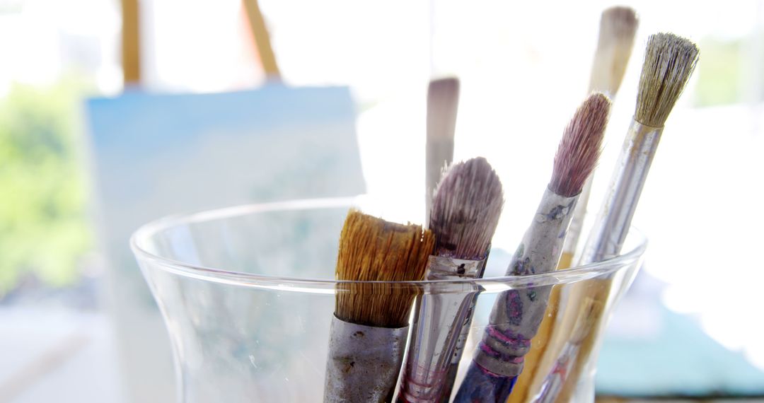 Close-up of Paintbrushes in Glass Jar in Art Studio - Free Images, Stock Photos and Pictures on Pikwizard.com