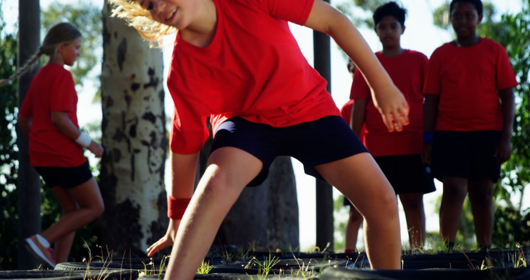 Teenagers Participating in Outdoor Obstacle Course Activity - Free Images, Stock Photos and Pictures on Pikwizard.com