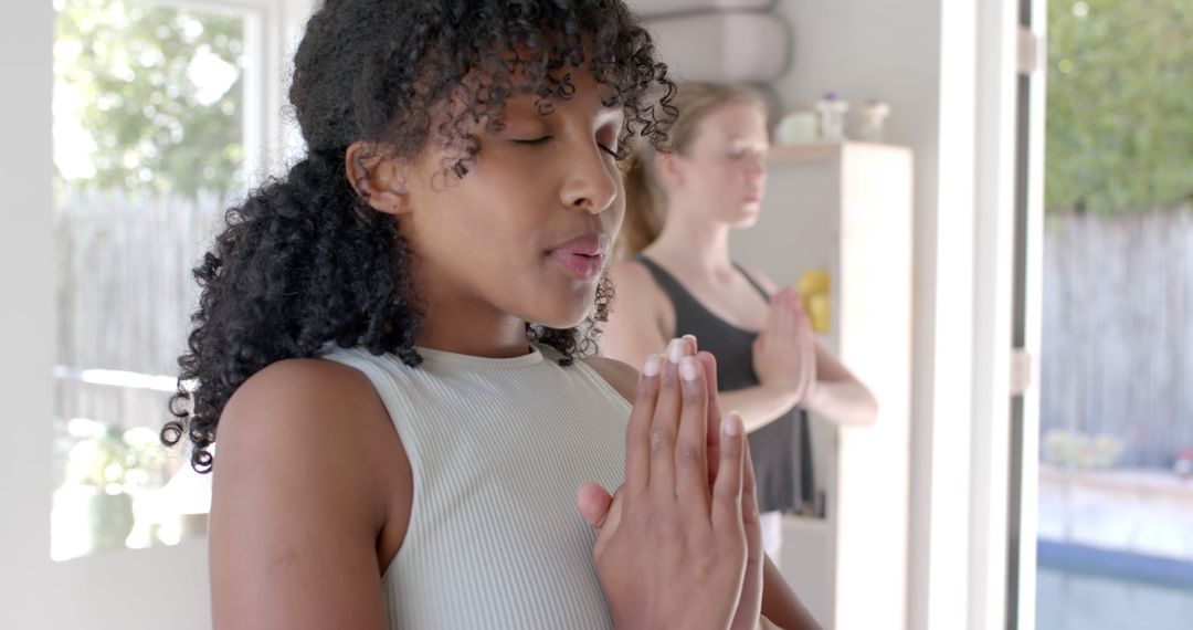 Diverse Women Practicing Yoga Meditation Indoors - Free Images, Stock Photos and Pictures on Pikwizard.com