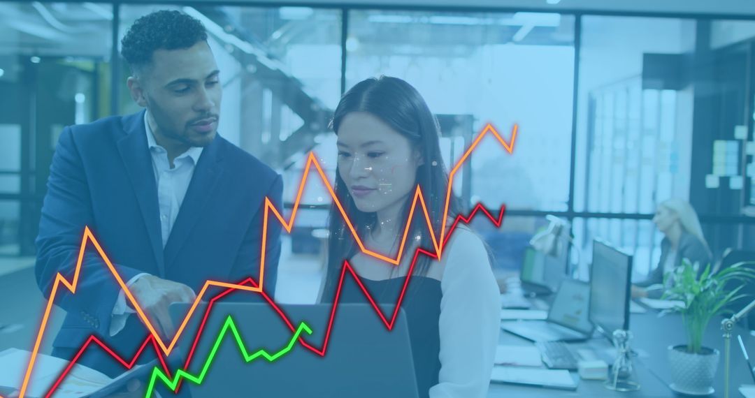 Diverse Business Team Analyzing Data Trends with Graph Overlays