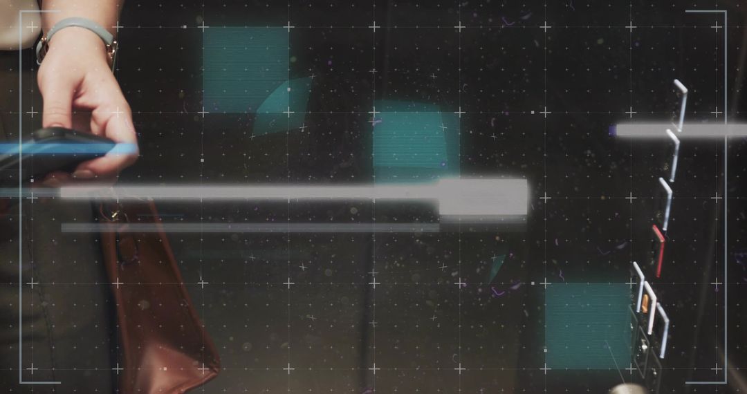 Left Hand Holding Smartphone in Modern Elevator with Digital Overlay