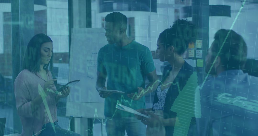 Diverse Team Discussing Business Strategy with Digital Technology