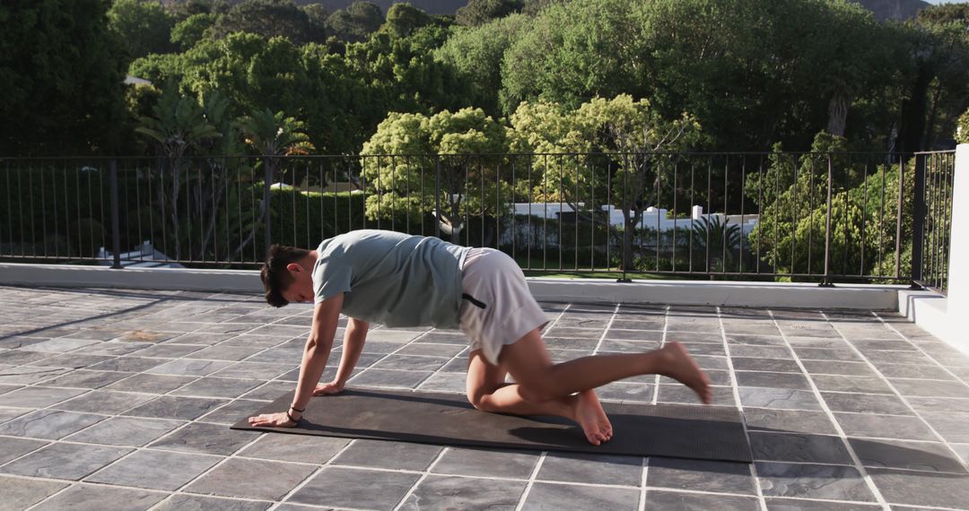 Dynamic Outdoor Plank Exercise on Terrace Yoga Workouts