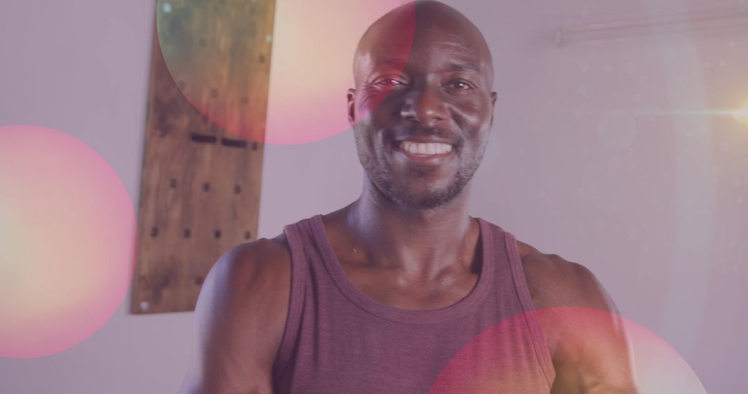 Smiling Strong Man With Overlay Lights