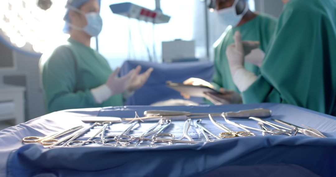 Surgeons Collaborating During Operation with Sterile Instruments