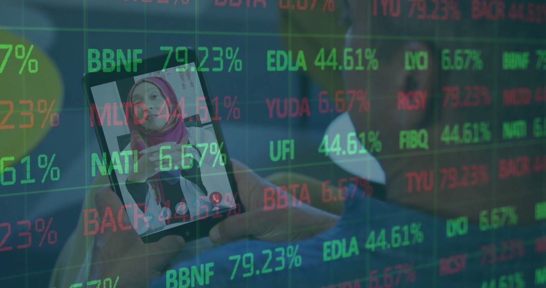 Businesswoman in Hijab Discussing Stock Data on Tablet