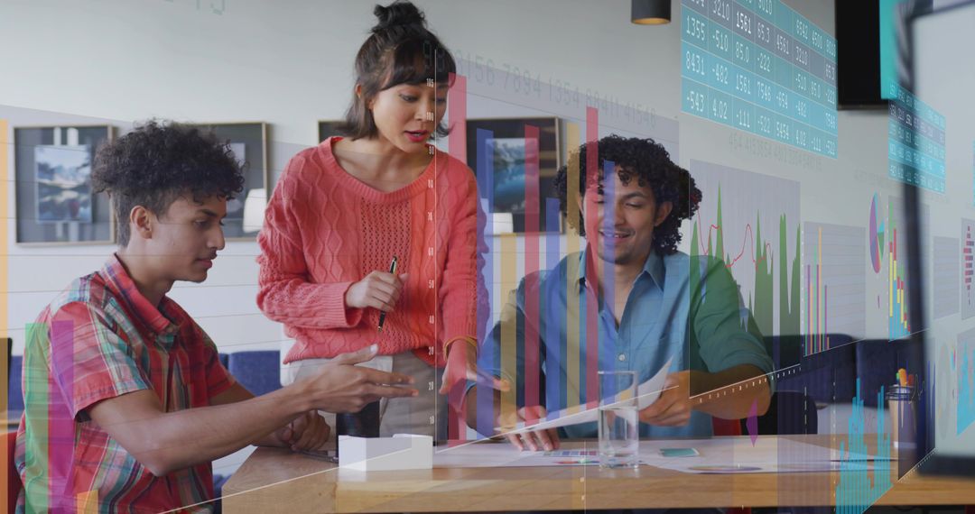 Young Professionals Collaborating with Digital Data Insights